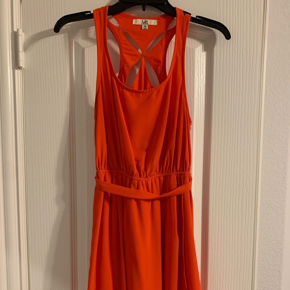 Orange dress with back cut outs and belt size M.